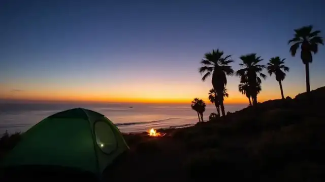 Tent camping at sunset on a coastal bluff in San Diego County overlooking the Pacific Ocean