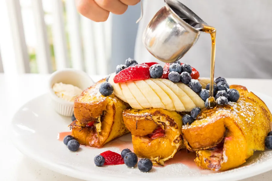 Brunch French toast plated at The Cottage La Jolla in San Diego