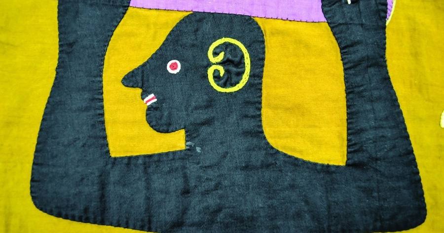 Colorful folk art installation at Mingei International Museum