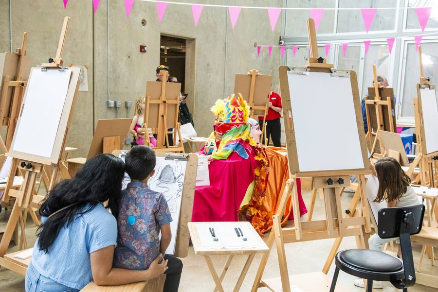 Children creating art inside The New Children's Museum